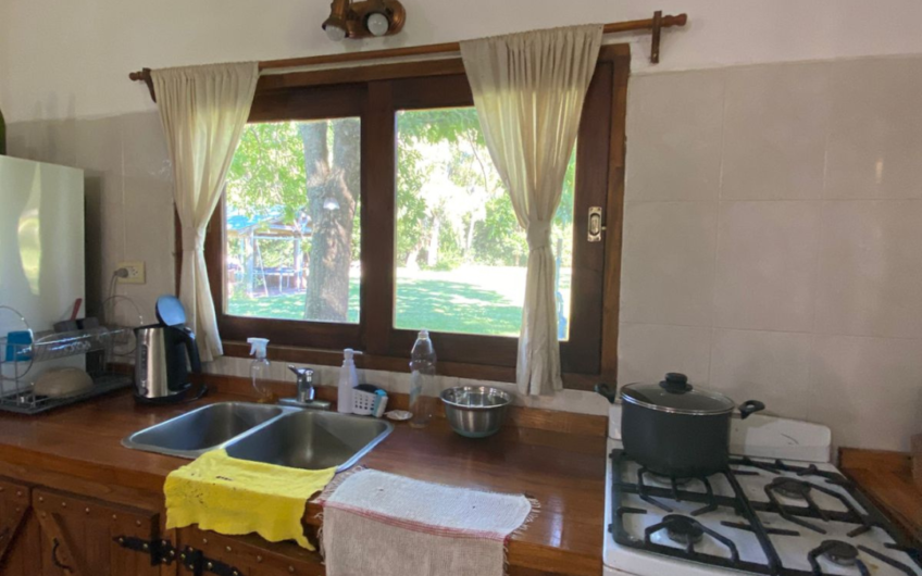 Campo de 11 hectáreas en venta con casas, cabañas, pecán y laguna natural